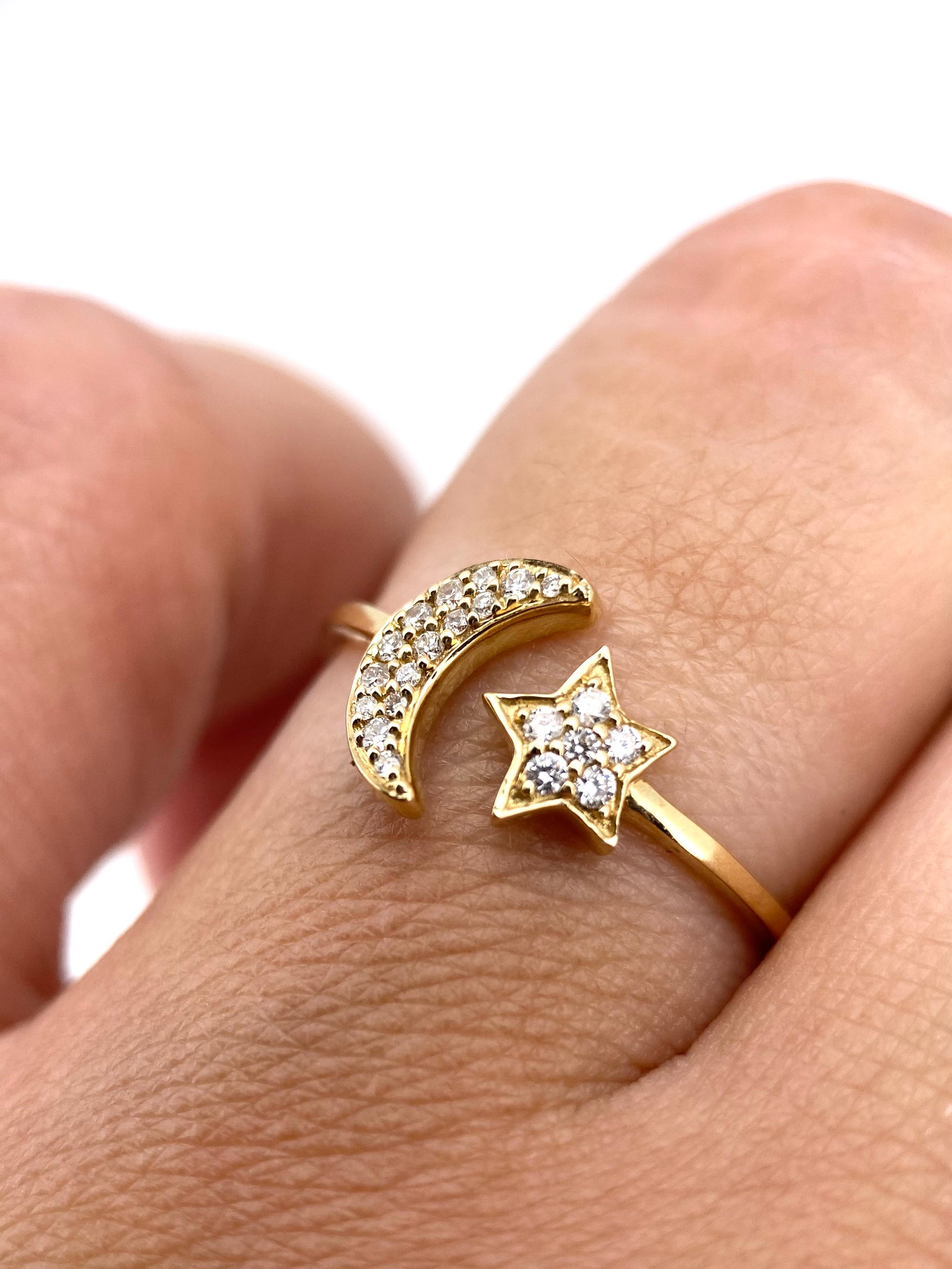 Churumbela Luna y Estrella 0.15ct Oro 14k Amarillo.            OF2350